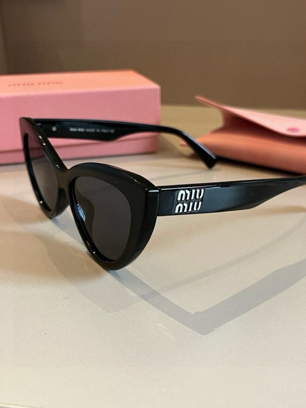 Miu Miu Frameless Sunglasses with UV Protection